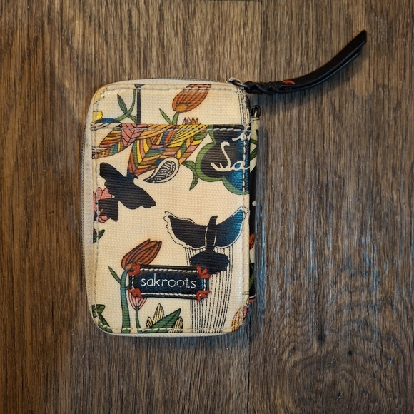 The Sakroots Peace Crossbody Wallet. - Picture 6 of 15